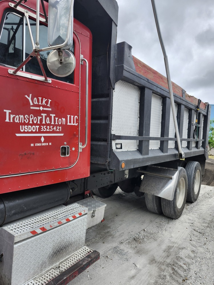 Yaiki Transportation team and equipment on a job site